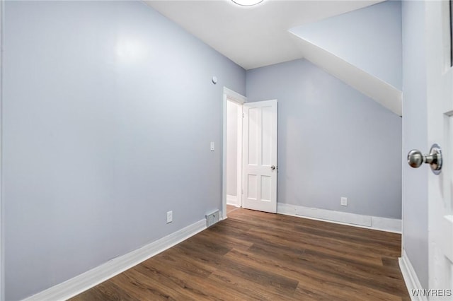 405 W Ferry St, Buffalo, NY 14213 - bonus room featuring wood finished floors, vaulted ceiling, and baseboards