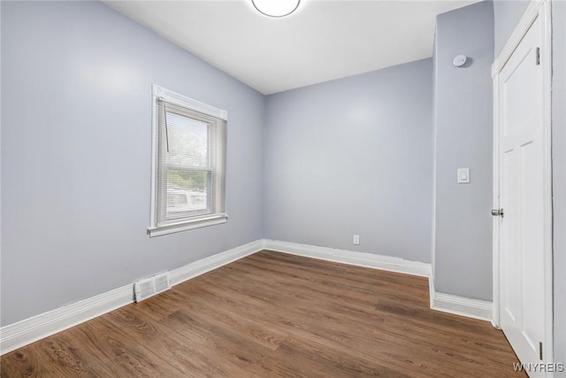 405 W Ferry St, Buffalo, NY 14213 - unfurnished room with dark wood-style flooring and baseboards