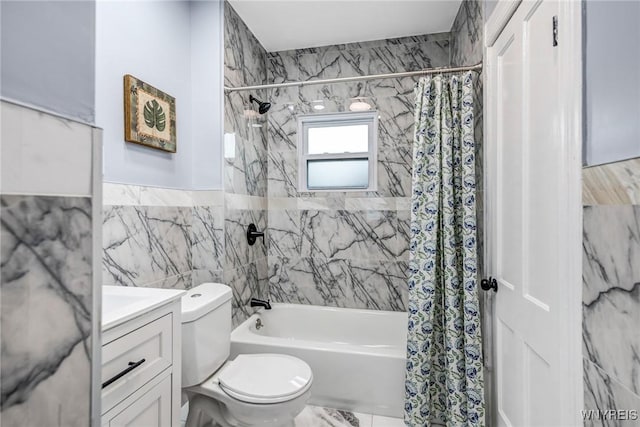 405 W Ferry St, Buffalo, NY 14213 - full bathroom with shower / tub combo, toilet, vanity, tile walls, and marble finish flooring