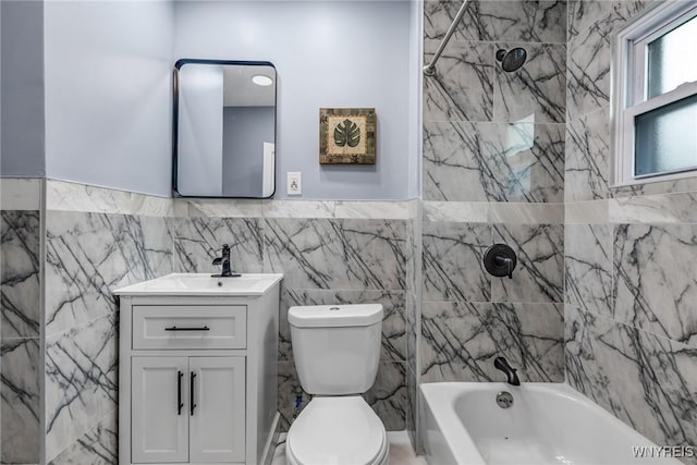 405 W Ferry St, Buffalo, NY 14213 - full bathroom featuring tile walls, vanity, toilet, bathtub / shower combination, and wainscoting