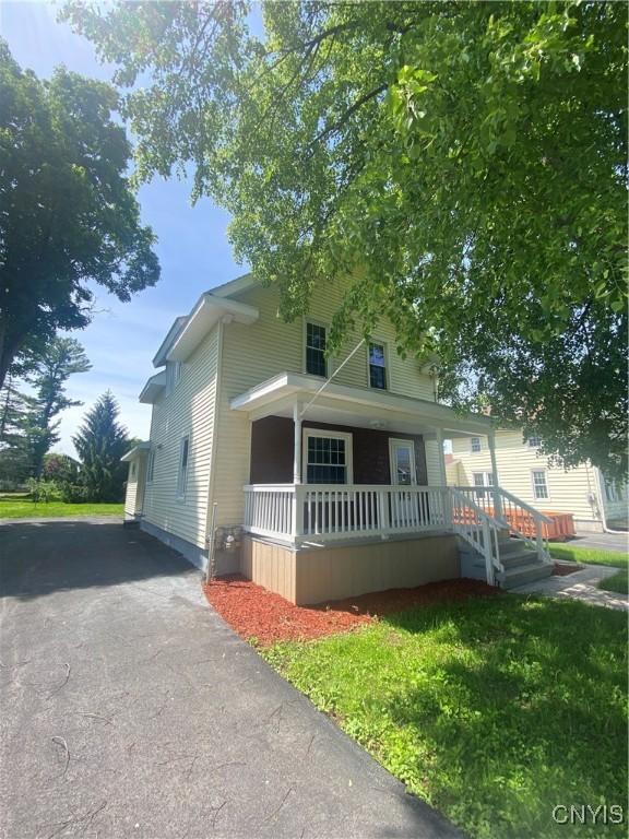 223 Primo Ave, Sherrill, NY 13461 - view of front facade with a porch