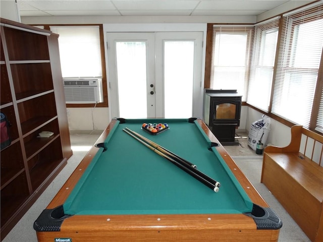 136 Platt St, Erwin, NY 14870 - rec room with pool table, a wood stove, a drop ceiling, french doors, and cooling unit