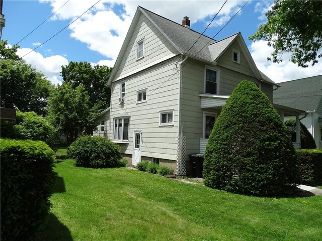 136 Platt St, Erwin, NY 14870 - view of home's exterior featuring a lawn and a chimney