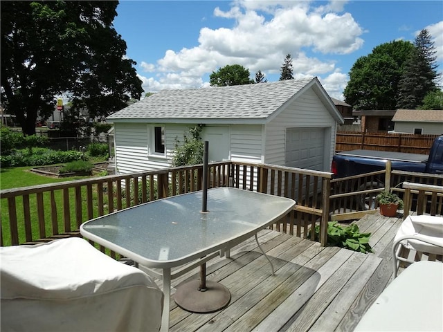 136 Platt St, Erwin, NY 14870 - wooden terrace with outdoor dining space, an outbuilding, and a garage