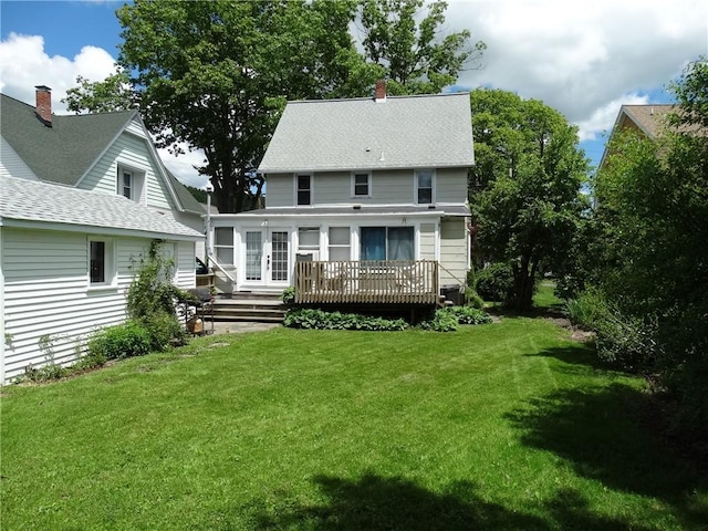 136 Platt St, Erwin, NY 14870 - back of property featuring french doors, a wooden deck, a lawn, a chimney, and roof with shingles