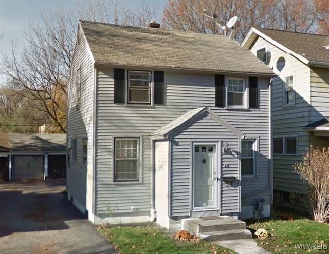58 Nellis Park, Rochester, NY 14608 - view of front of property featuring a shingled roof and an outdoor structure