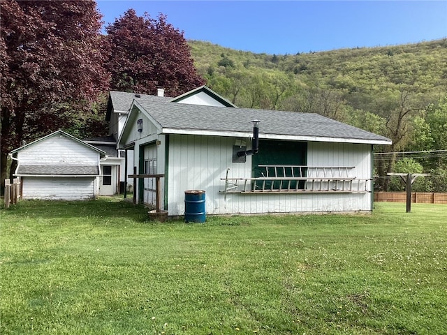 2287 State Route 352, Big Flats, NY 14903 - view of front of property featuring a wooded view and roof with shingles