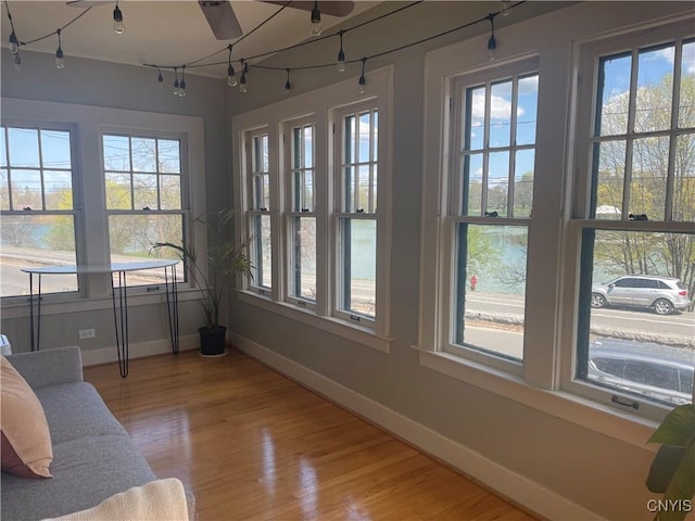 626 Roberts Ave, Syracuse, NY 13207 - sunroom / solarium featuring rail lighting