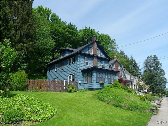 626 Roberts Ave, Syracuse, NY 13207 - view of home's exterior featuring a chimney