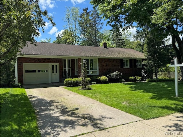 725 Warren Dr, Aurora, NY 14052 - single story home with a garage, a front lawn, and brick siding