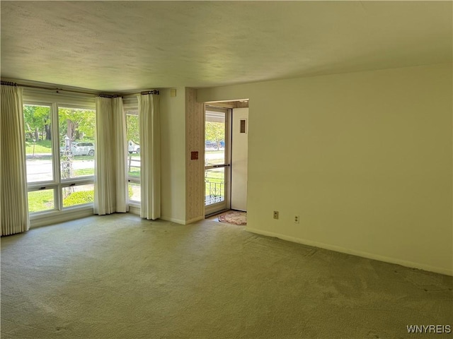 725 Warren Dr, Aurora, NY 14052 - carpeted spare room featuring baseboards