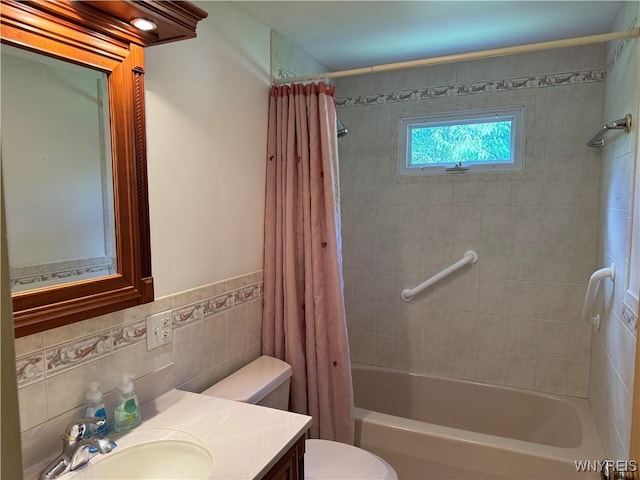 725 Warren Dr, Aurora, NY 14052 - full bathroom with toilet, shower / tub combo with curtain, vanity, and tile walls