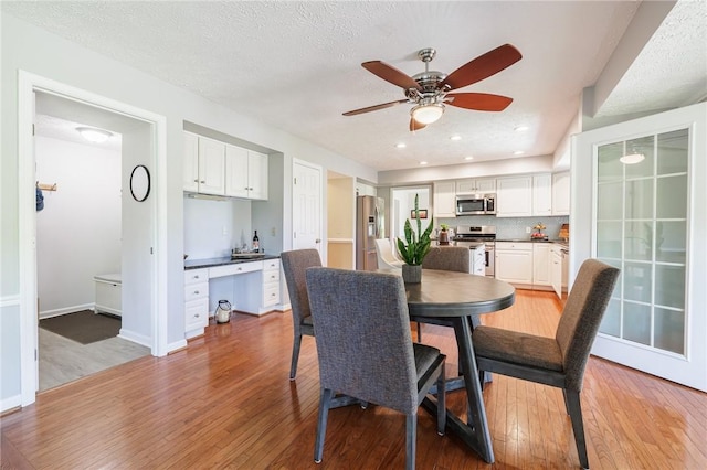 56 Edenfield Rd, Penfield, NY 14526 - dining room with hardwood / wood-style flooring, ceiling fan, a desk, baseboards, and recessed lighting