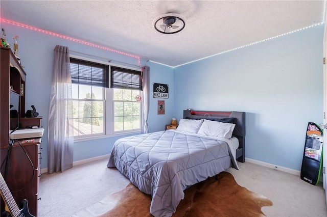 56 Edenfield Rd, Penfield, NY 14526 - bedroom with carpet flooring, baseboards, and a textured ceiling