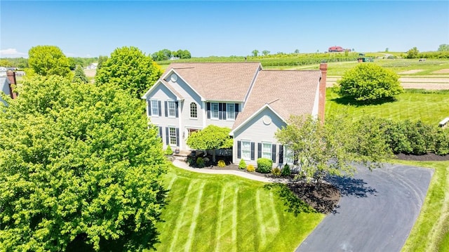 56 Edenfield Rd, Penfield, NY 14526 - view of front of house with a front lawn