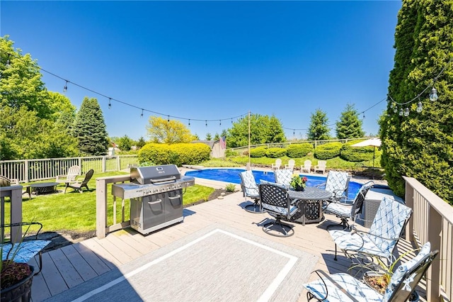 56 Edenfield Rd, Penfield, NY 14526 - deck featuring area for grilling, outdoor dining area, and an outdoor fire pit