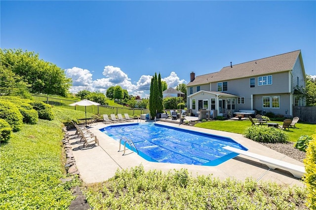 56 Edenfield Rd, Penfield, NY 14526 - view of swimming pool featuring a patio, a diving board, and outdoor lounge area