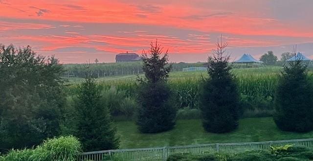56 Edenfield Rd, Penfield, NY 14526 - yard at dusk featuring a view of rural / pastoral area