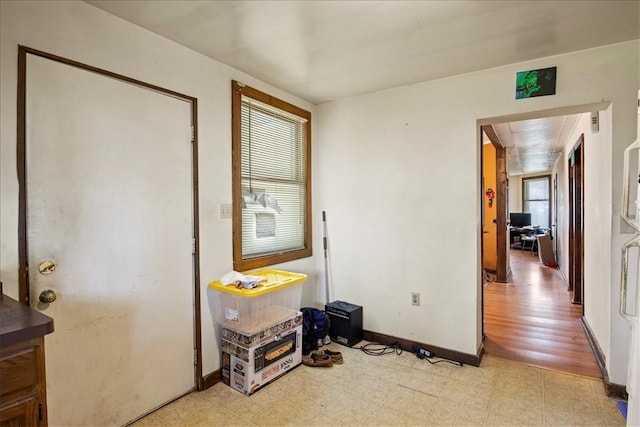 262 Pearl St, Rochester, NY 14607 - hallway with baseboards and light floors