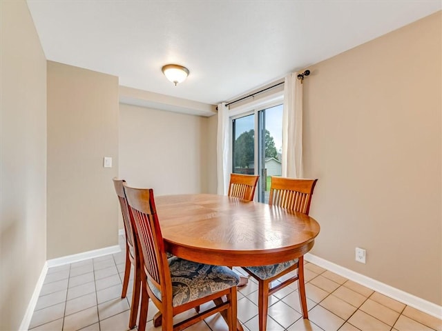 26 Groveland, Geneseo, NY 14454 - dining area with light tile patterned floors and baseboards