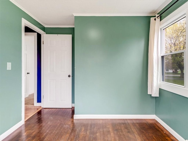 26 Groveland, Geneseo, NY 14454 - spare room with crown molding, wood-type flooring, and baseboards