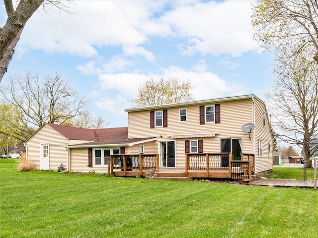 26 Groveland, Geneseo, NY 14454 - back of house featuring a deck and a lawn