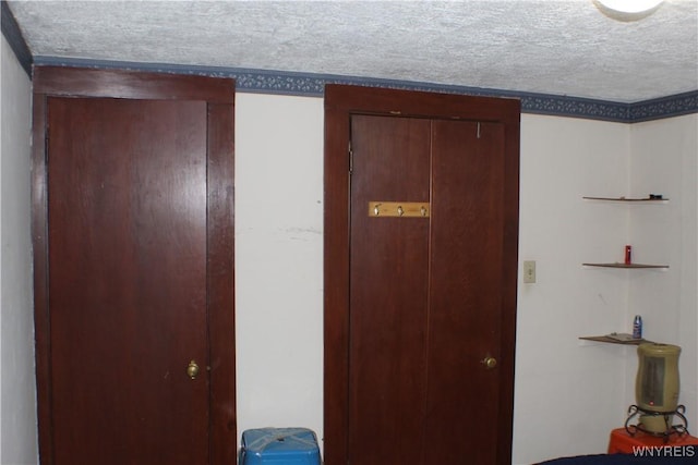 116 Merden St, Salamanca-City, NY 14779 - unfurnished bedroom featuring a textured ceiling