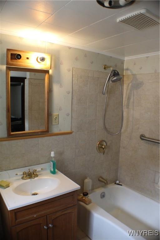 116 Merden St, Salamanca-City, NY 14779 - full bath with vanity, shower / tub combination, and tile walls