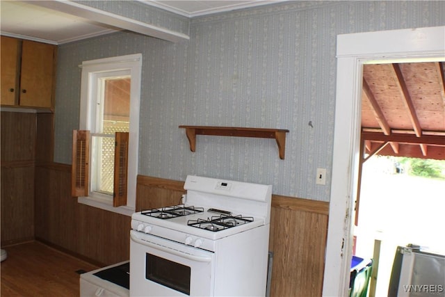 116 Merden St, Salamanca-City, NY 14779 - kitchen featuring white gas stove, wood finished floors, beamed ceiling, crown molding, and wood walls