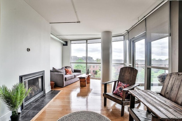 132 Lakefront Blvd Unit 204, Buffalo, NY 14202 - sunroom with floor to ceiling windows and hardwood / wood-style flooring