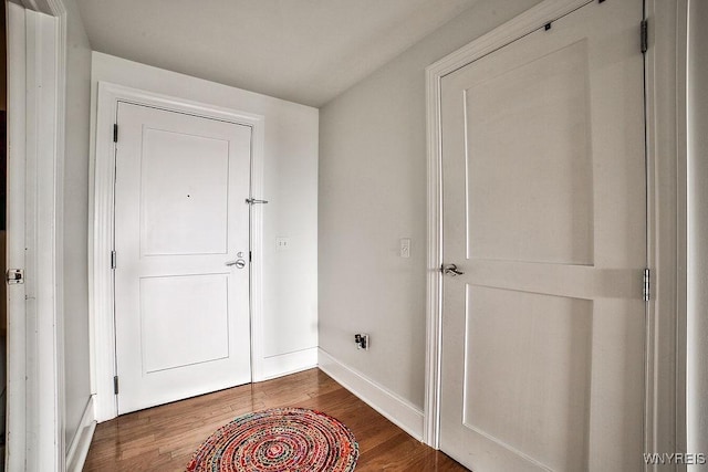 132 Lakefront Blvd Unit 204, Buffalo, NY 14202 - entryway featuring baseboards and wood finished floors