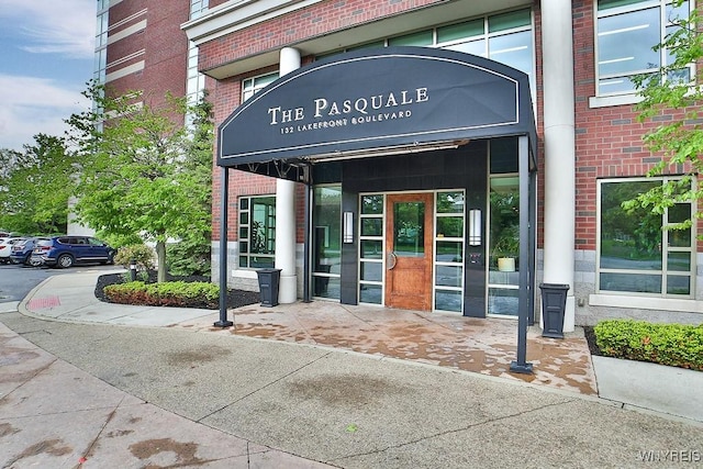 132 Lakefront Blvd Unit 204, Buffalo, NY 14202 - doorway to property featuring brick siding