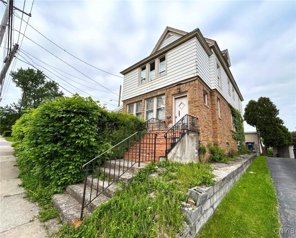 616 Teall Ave, Syracuse, NY 13206 - view of front of home featuring brick siding