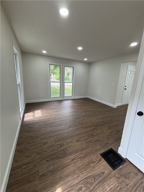 3758 Lake Rd N, Clarkson, NY 14420 - unfurnished room featuring baseboards, dark wood-style flooring, and recessed lighting
