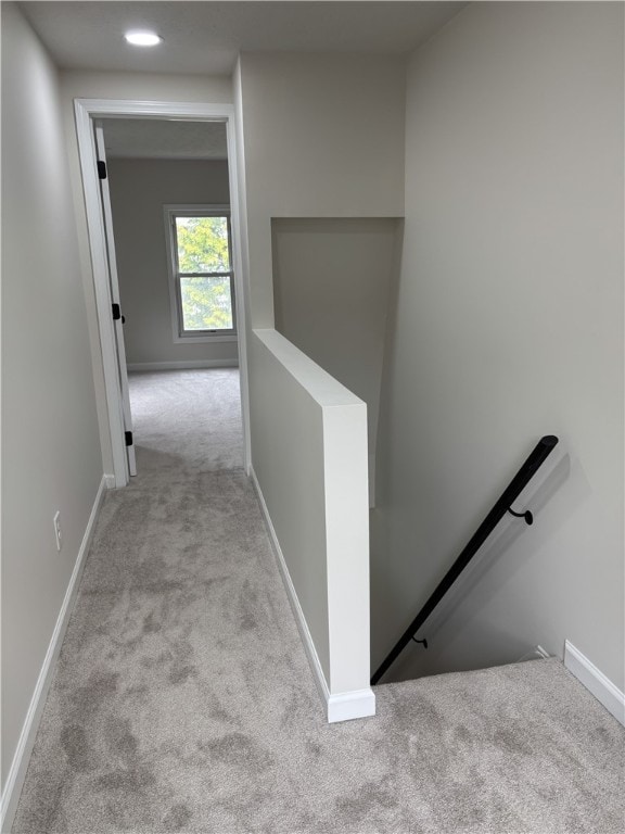 3758 Lake Rd N, Clarkson, NY 14420 - hall with an upstairs landing, carpet flooring, and baseboards