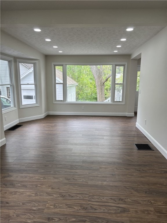 3758 Lake Rd N, Clarkson, NY 14420 - unfurnished room with plenty of natural light, baseboards, dark wood finished floors, and recessed lighting