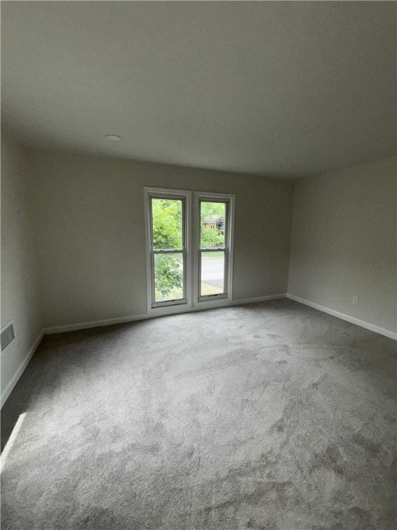 3758 Lake Rd N, Clarkson, NY 14420 - spare room featuring carpet flooring and baseboards