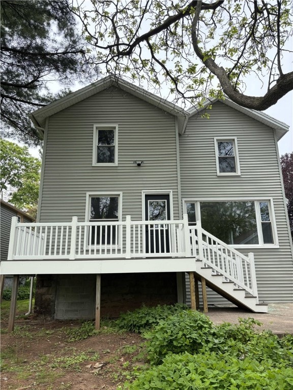 3758 Lake Rd N, Clarkson, NY 14420 - rear view of house featuring a wooden deck and stairway