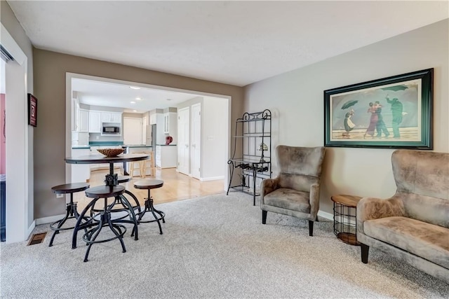 16 Canterbury Trl, Penfield, NY 14450 - sitting room featuring light carpet and baseboards