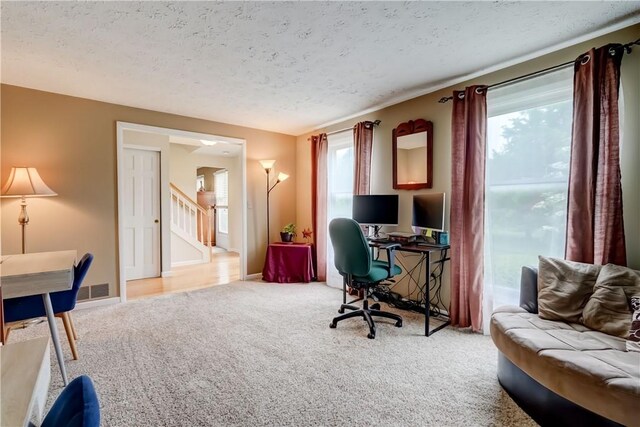 16 Canterbury Trl, Penfield, NY 14450 - carpeted office space featuring a textured ceiling