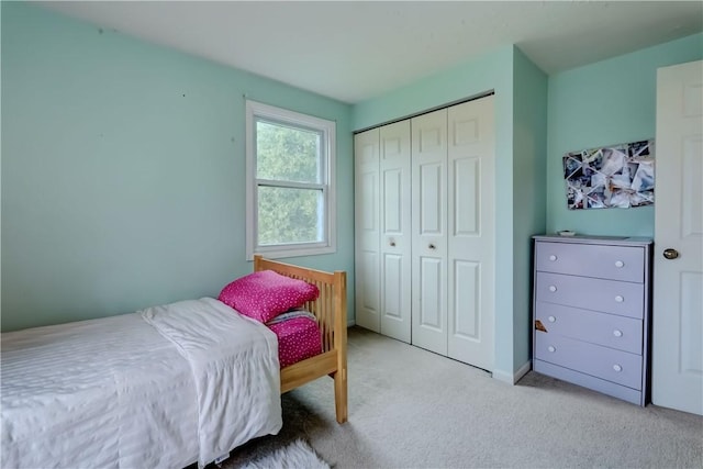 16 Canterbury Trl, Penfield, NY 14450 - bedroom featuring a closet and light colored carpet