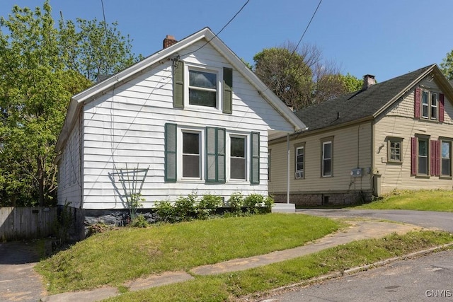 410 John St, Syracuse, NY 13208 - bungalow-style house featuring a chimney