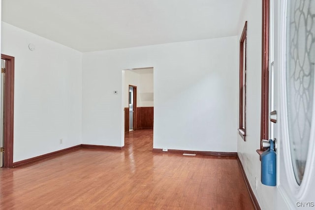 410 John St, Syracuse, NY 13208 - unfurnished room with light wood-type flooring and baseboards
