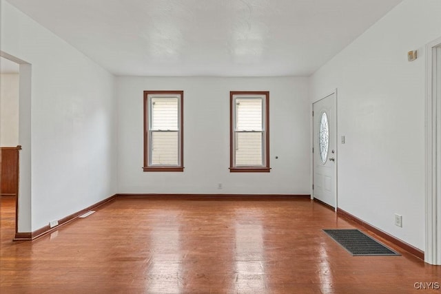 410 John St, Syracuse, NY 13208 - unfurnished room with wood finished floors and baseboards