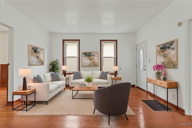 410 John St, Syracuse, NY 13208 - living room with wood finished floors and baseboards
