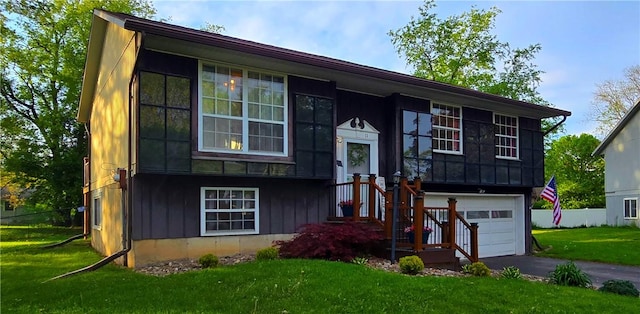 11 Cherry Cir, Erwin, NY 14870 - raised ranch featuring a garage and asphalt driveway