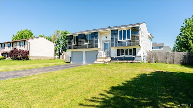 8010 Ashwood Dr, Niagara, NY 14304 - raised ranch with driveway and a garage