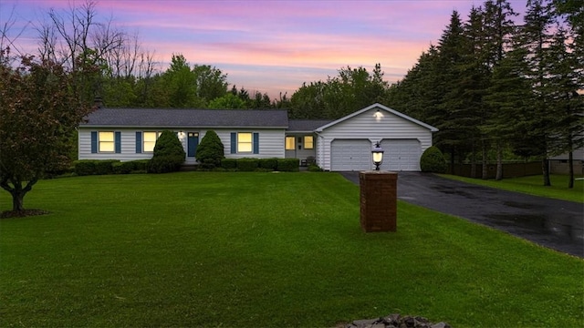 3343 Cory Hill Rd, Marion, NY 14505 - single story home with an attached garage, asphalt driveway, and a lawn