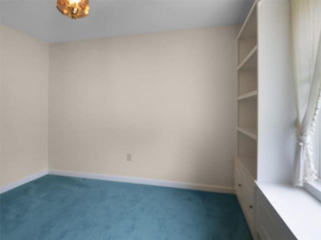 3343 Cory Hill Rd, Marion, NY 14505 - carpeted spare room featuring baseboards