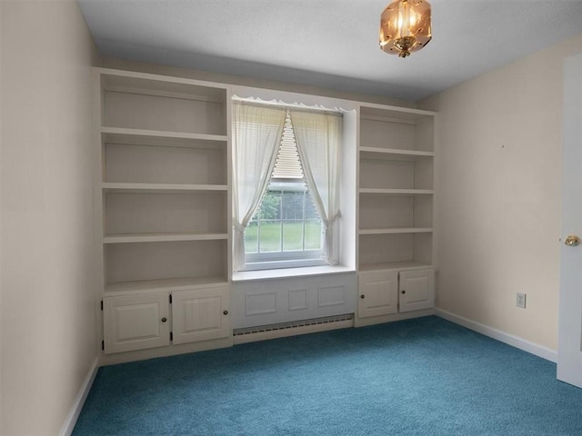 3343 Cory Hill Rd, Marion, NY 14505 - unfurnished room featuring carpet flooring, a baseboard heating unit, and baseboards